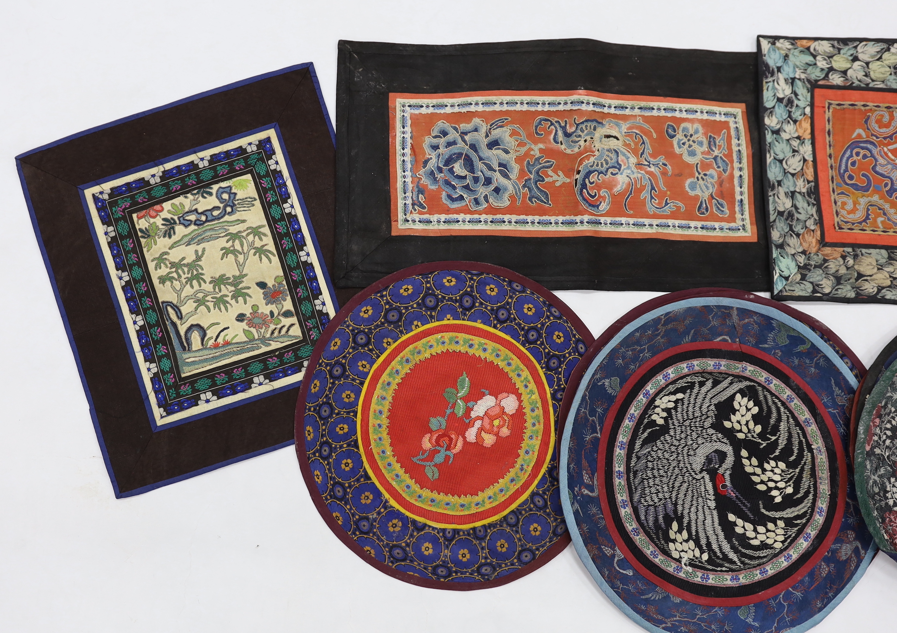 Three Beijing knot silk embroidered rectangular mats with damask borders, seven circular bird motif embroideries and two of deer and birds (12)